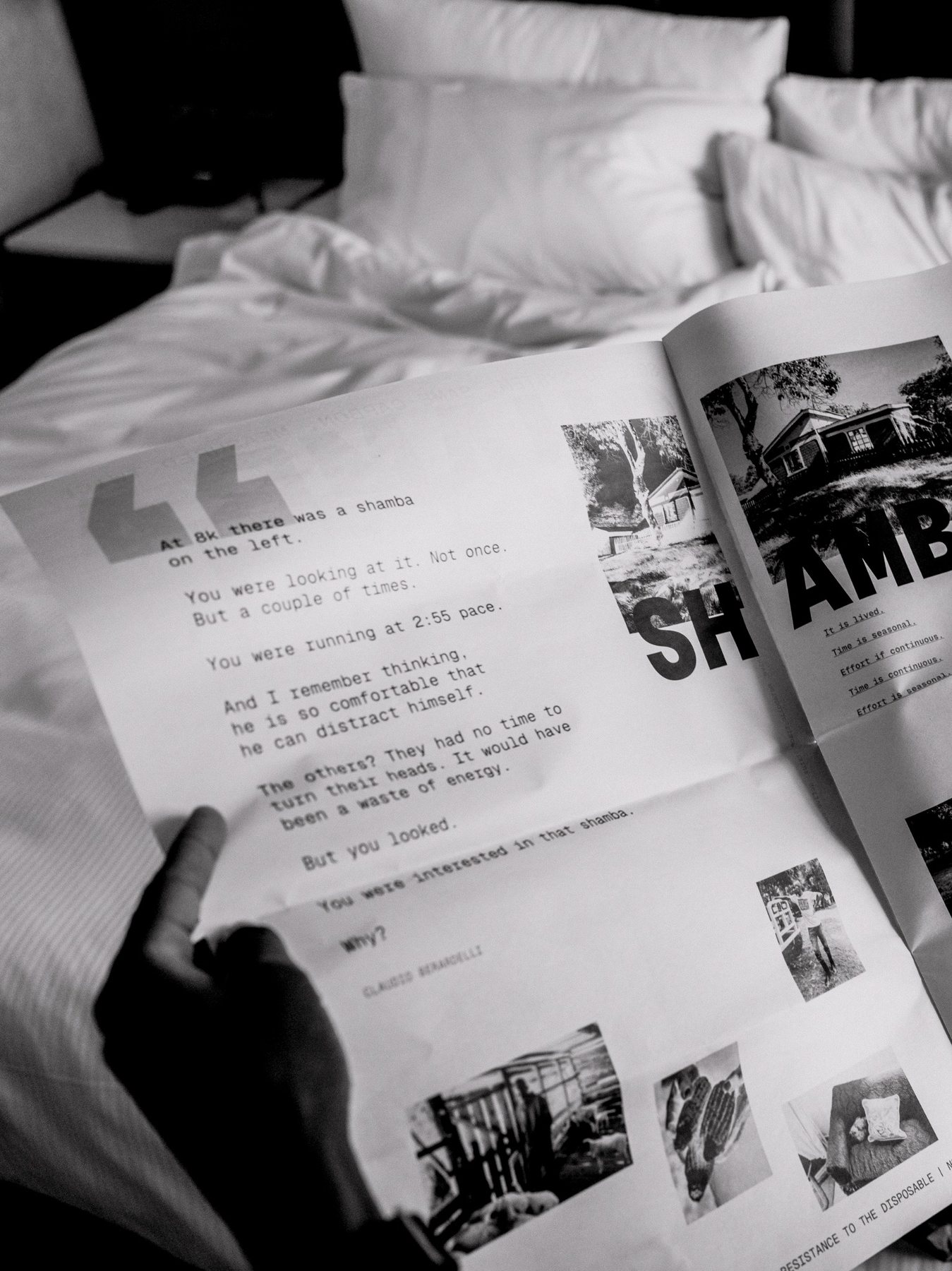 Close view of the Shamba System newspaper on a bed.